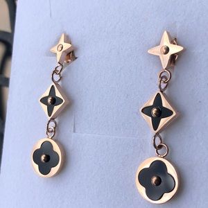 COPY - Onyx Star Flower blossom dangle earrings rose gold